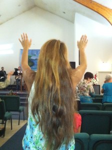 Woman praising Jesus