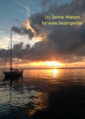 Janine sailboat at sunset tiny