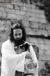 Jesus hugging girl